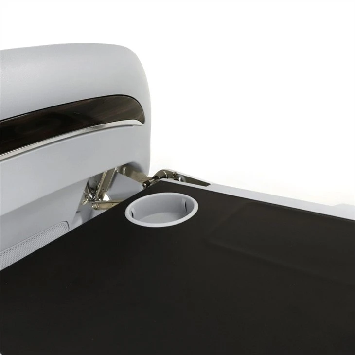 Cup holder on seatback table in Toyota Sienna
